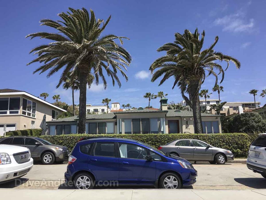 2010 blue Honda Fit parked on the street in La Jolla California