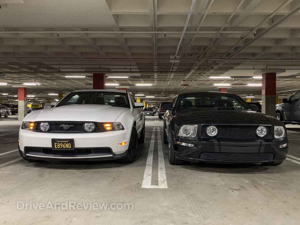 My 2012 mustang GT parked next to a 2006 mustang GT