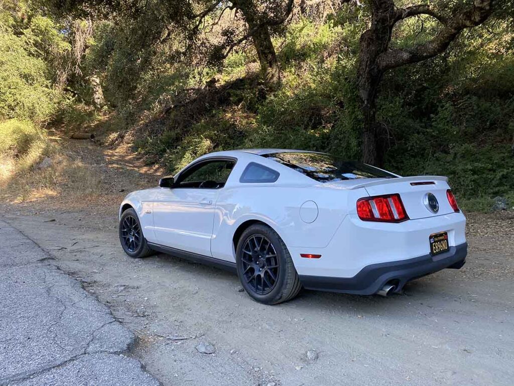 White 2012 Ford mustang GT in the mountains