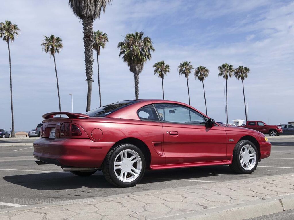 Rio red 1996 Ford mustang GT at La Jolla Shores Beach San Diego